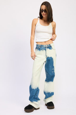 Arlo bleach tie dye wide leg jeans front view, large white bleach areas on indigo denim, abstract pattern, white crop top