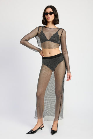 three quarter view sheer rhinestone mesh crop top with co-ord maxi skirt showing long sleeve and sparkle detail