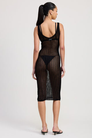 close up crochet weave black crochet midi dress showing open hole pattern and metallic bead embellishment inside weave