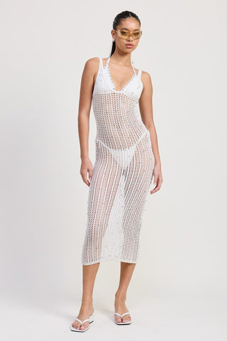 styled view black crochet midi dress showing gold accessory beside the open crochet body