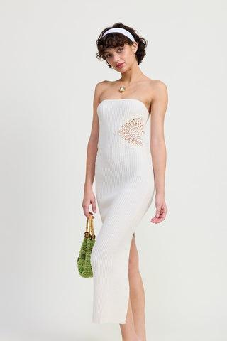 three quarter view white strapless bodycon tube midi dress showing ribbed knit, crochet hip patch and midi length
