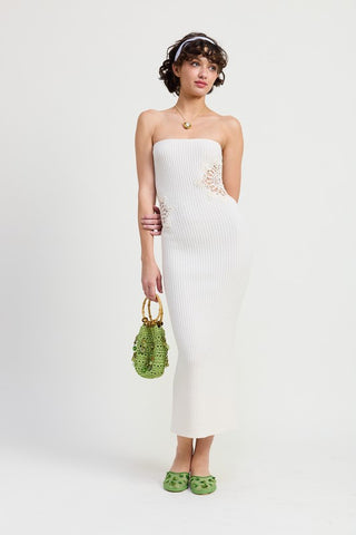 Daisy white strapless bodycon midi dress with large crochet mandala doily patch at hip, full length front view