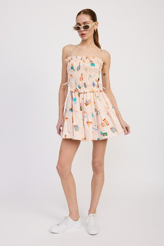 full length side view cotton poplin mini dress with tiered skirt volume and beach illustration novelty print