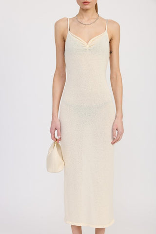 three quarter view cream spaghetti strap midi dress showing fitted bodycon silhouette and sweetheart neckline