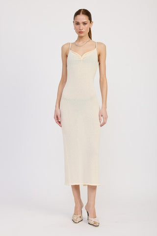 side profile cream ivory spaghetti strap midi dress showing bodycon silhouette and midi length from side