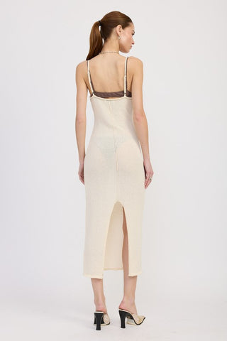 close up fabric detail cream spaghetti strap midi dress showing subtle polyester shimmer and bodycon fit