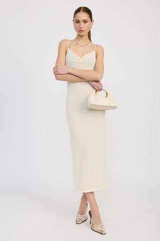back view cream spaghetti strap bodycon midi dress showing strap construction and clean fitted silhouette