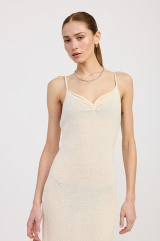 close up neckline cream spaghetti strap midi dress showing sweetheart adjacent neckline seam detail