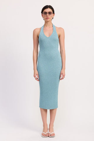 back view teal metallic halter knit dress showing open halter back, back tie construction and ribbed knit from behind