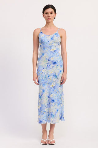 close up bust detail floral satin slip midi dress showing V-neck spaghetti straps and impressionist watercolor floral print