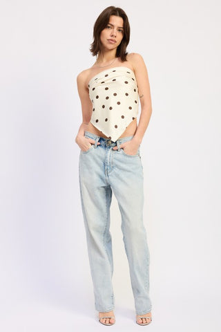 close-up of bandana fold and large brown polka dot pattern on ivory strapless crop top