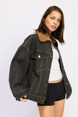 close-up camel corduroy collar on black washed denim jacket showing two heritage fabric contrast detail