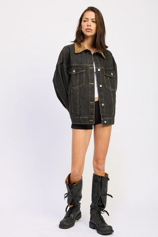three-quarter view Patty patchwork denim jacket showing corduroy collar contrast and black washed denim texture