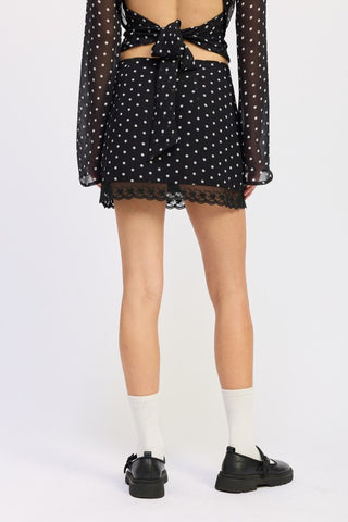 co-ord set look black polka dot lace hem mini skirt worn with matching sheer long sleeve crop top