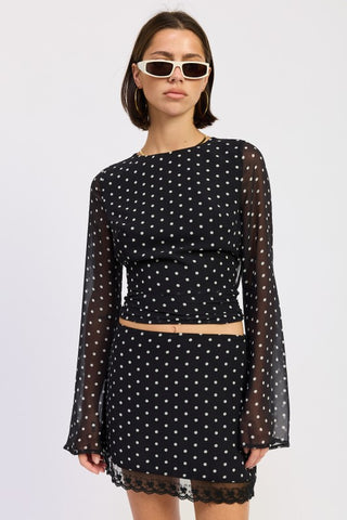 Coco long sleeve sheer crop top in black white polka dot, bell sleeves, fitted lined body, open back tie