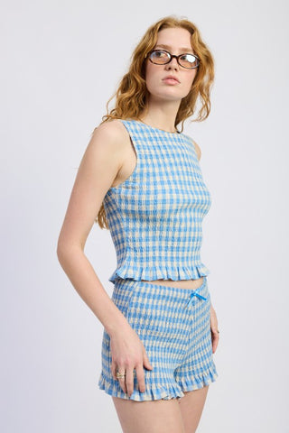back view blue gingham smocked shorts showing all-over shirring and drawstring waist from behind
