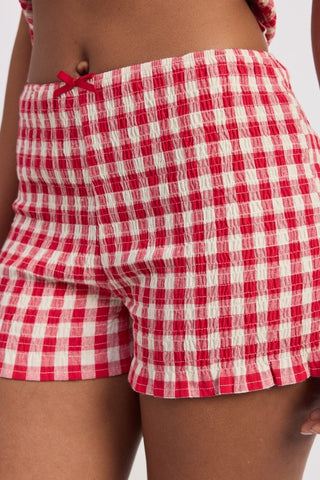 waist detail blue gingham smocked shorts showing drawstring and smocked elastic waistband construction