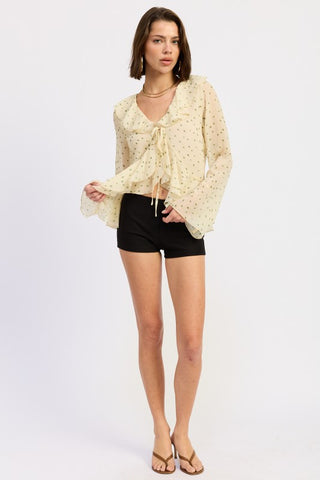 side view open flyaway butterfly blouse in ivory green polka dot showing ruffle cascade and long sleeve