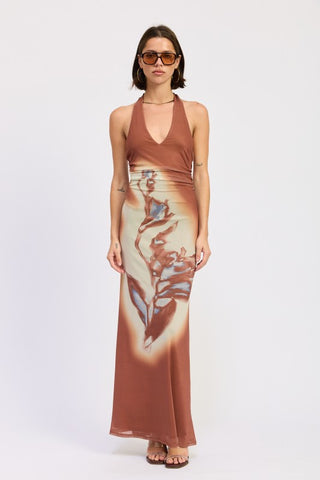 back view terracotta halter maxi dress showing open back construction, neck tie closure and abstract print from behind