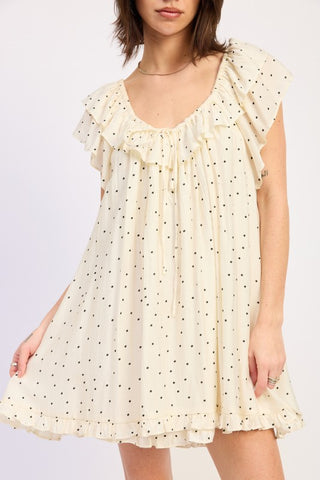 front view ivory polka dot babydoll romper showing triple ruffle trim at neckline and flutter sleeves