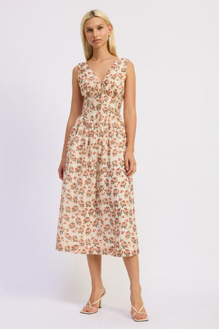 side view model cream floral tiered corset dress showing midi length and thick strap detail