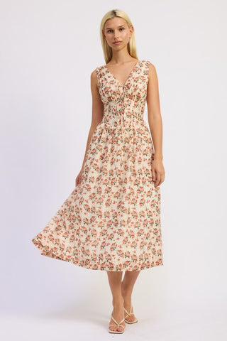 three-quarter view model in cream floral corset midi dress showing tiered full skirt and midi length