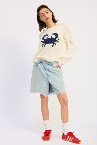 side profile model in light wash bermuda denim shorts showing above knee proportion and relaxed leg fit