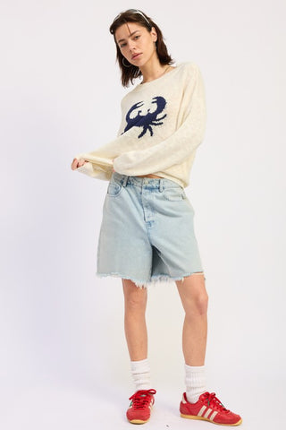 front view Gidget light blue distressed denim bermuda shorts showing relaxed mid rise fit and above knee length