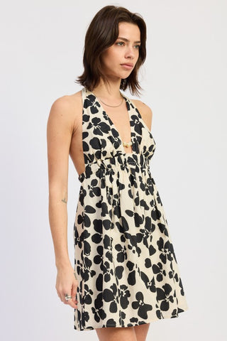 detail shot large scale graphic black petal shapes on ivory cotton halter dress fabric