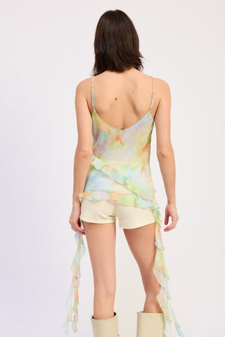 movement shot ruffle cami top showing chiffon drape and trailing streamer ribbons in motion from front