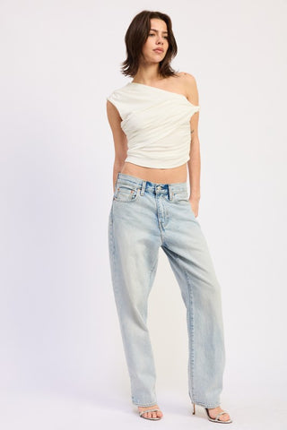 front view asymmetrical cream one shoulder crop top showing twist drape and exposed shoulder with bodycon torso