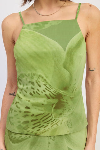 close-up bodice detail tonal green orchid print mesh top showing macro botanical scale and spaghetti straps