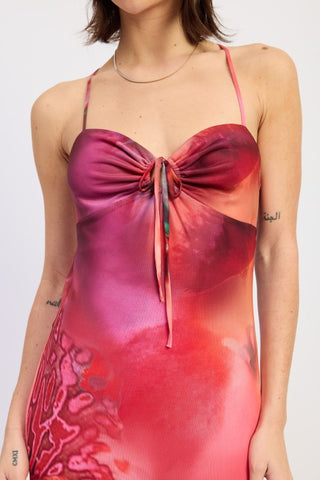 back view floral halter maxi dress showing cross back halter strap construction and open back