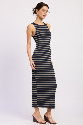 three quarter angle navy cream ribbed stripe maxi dress showing knit drape and bodycon floor length fit