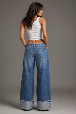 Close detail cowhide panel insert wide leg jeans GJG Denim medium wash natural pattern