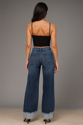 Front view y2k low rise wide leg jeans Monterey wash GJG Denim cuffed hem