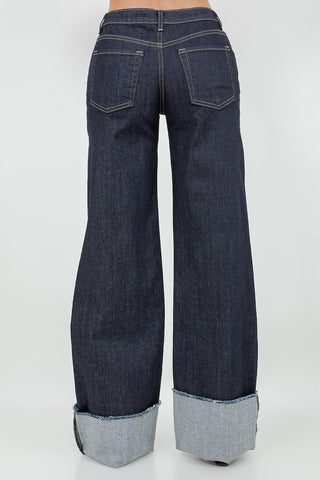 Detail view contrast grey fold-over cuff dark rinse low rise wide leg jeans