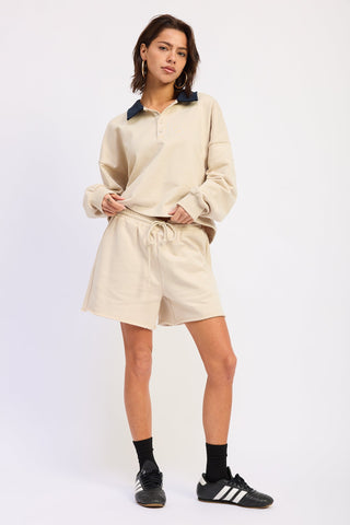 Scout French terry shorts with pockets in cream cotton, drawstring waist, mid-thigh length, relaxed fit