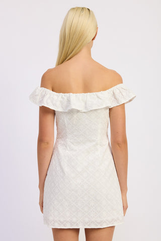 White off-shoulder dress worn by a person on a white background