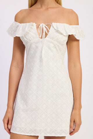 White off-shoulder dress with ruffled sleeves on a white background