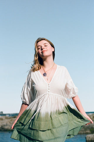 solid (likely) Poet Puff Sleeve Wrap Mini Dress — side view