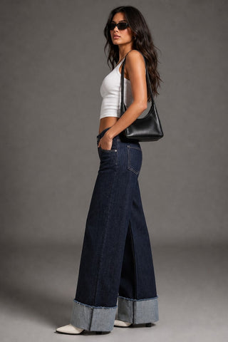 Detail view contrast cuff dark wash wide leg jeans lighter interior revealed