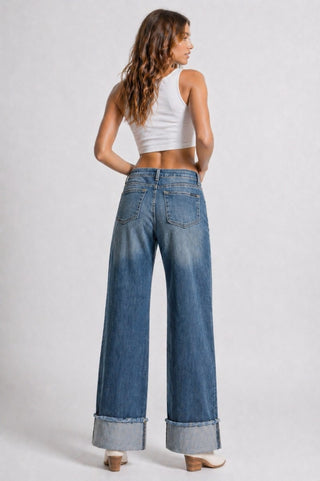 Side profile studded wide leg jeans stud seam hip to hem medium blue denim