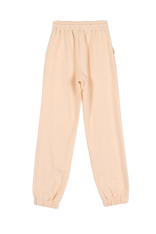 Cream sweat jogger pant from Sweatpants collection you can buy now from Fashion And Icon online shop