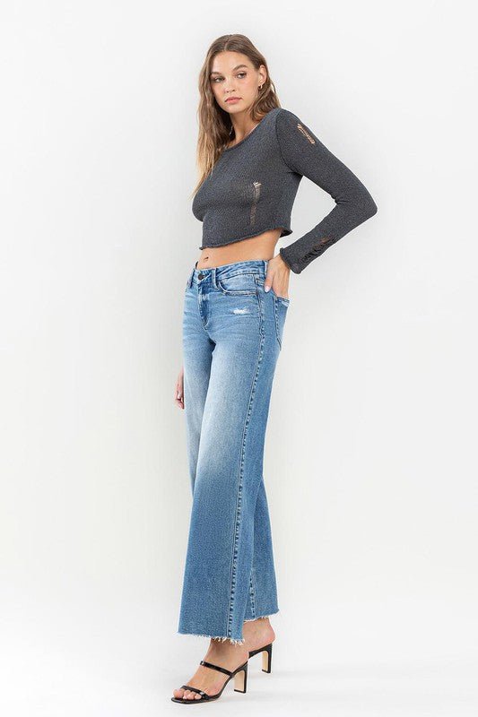 Mid Rise Raw Hem Wide Leg Jeans from collection you can buy now from Fashion And Icon online shop