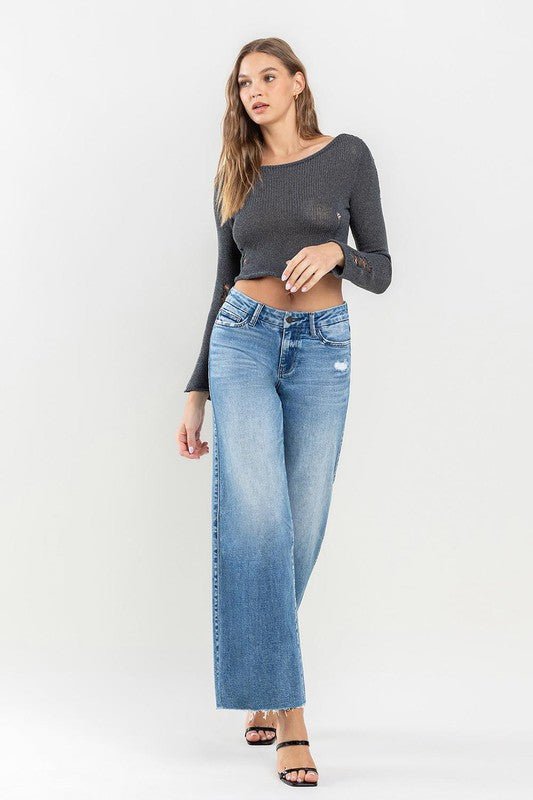 Mid Rise Raw Hem Wide Leg Jeans from collection you can buy now from Fashion And Icon online shop