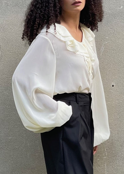 Ruffle Balloon Sleeve Tie Neck Blouse from Blouses collection you can buy now from Fashion And Icon online shop